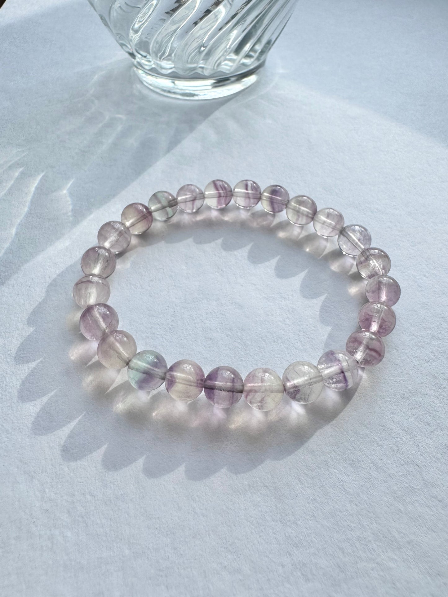 Enhance your mental clarity and creativity with our vibrant rainbow fluorite crystal bracelet