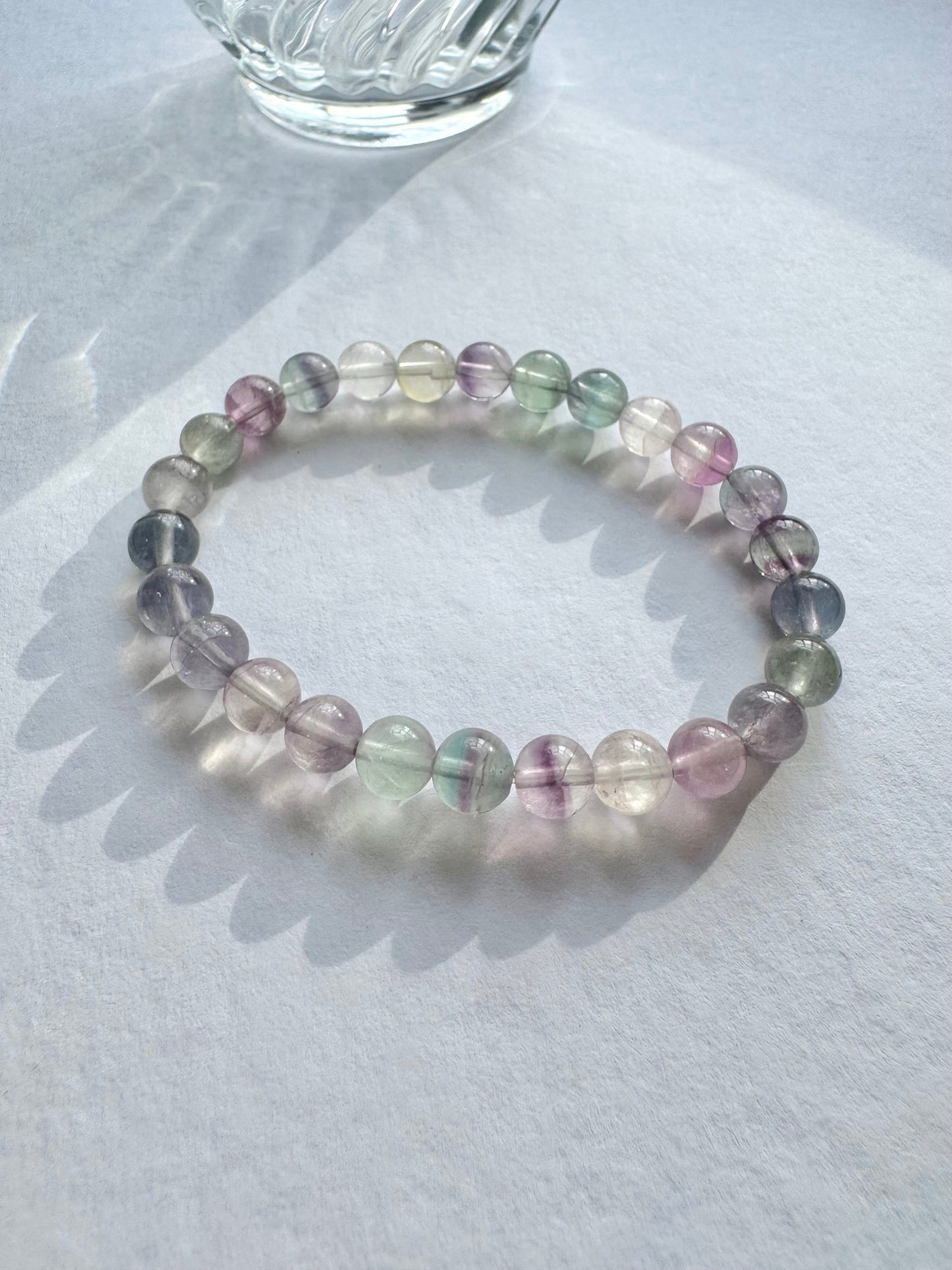 Enhance your mental clarity and creativity with our vibrant rainbow fluorite crystal bracelet