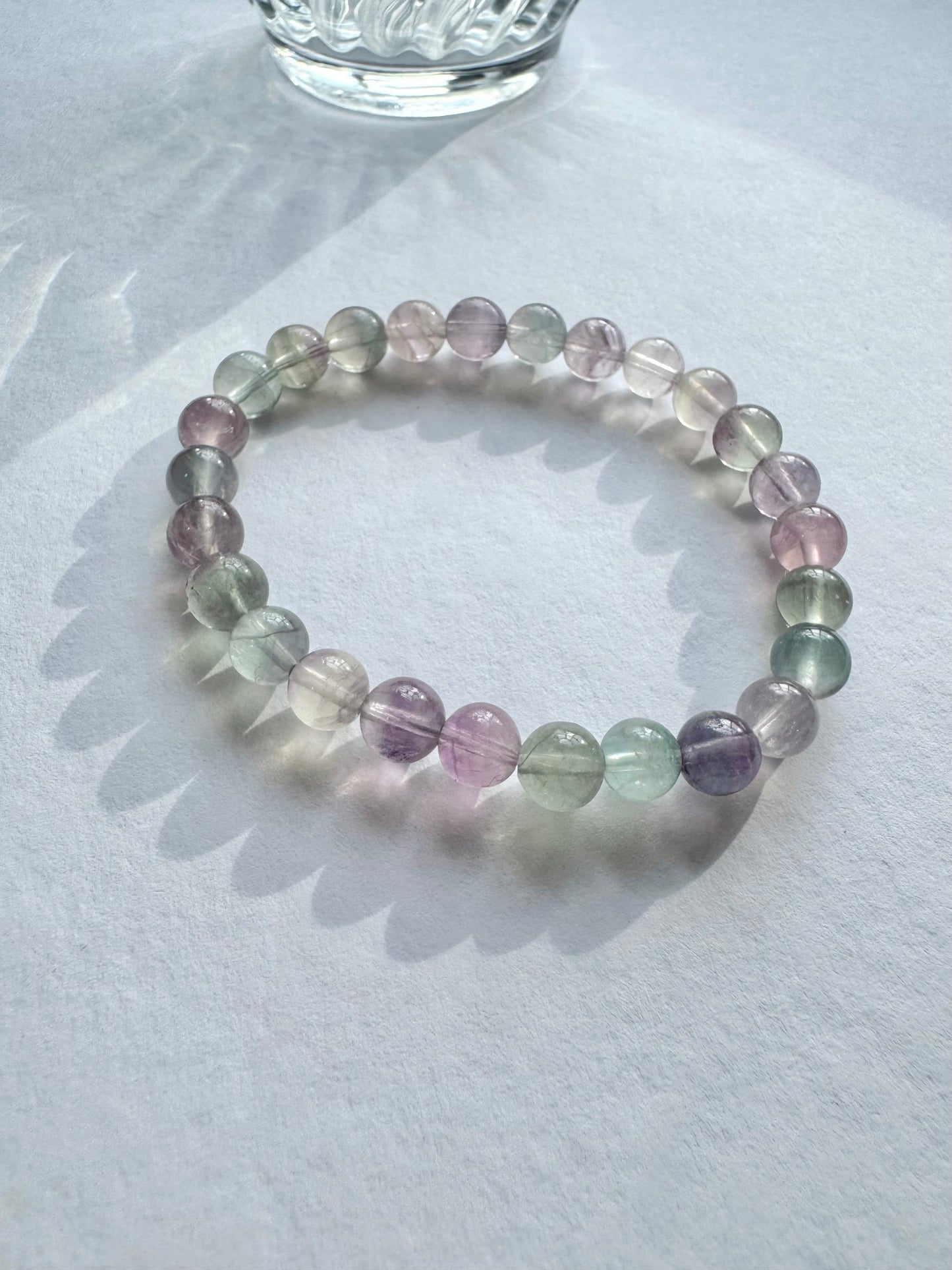 Enhance your mental clarity and creativity with our vibrant rainbow fluorite crystal bracelet